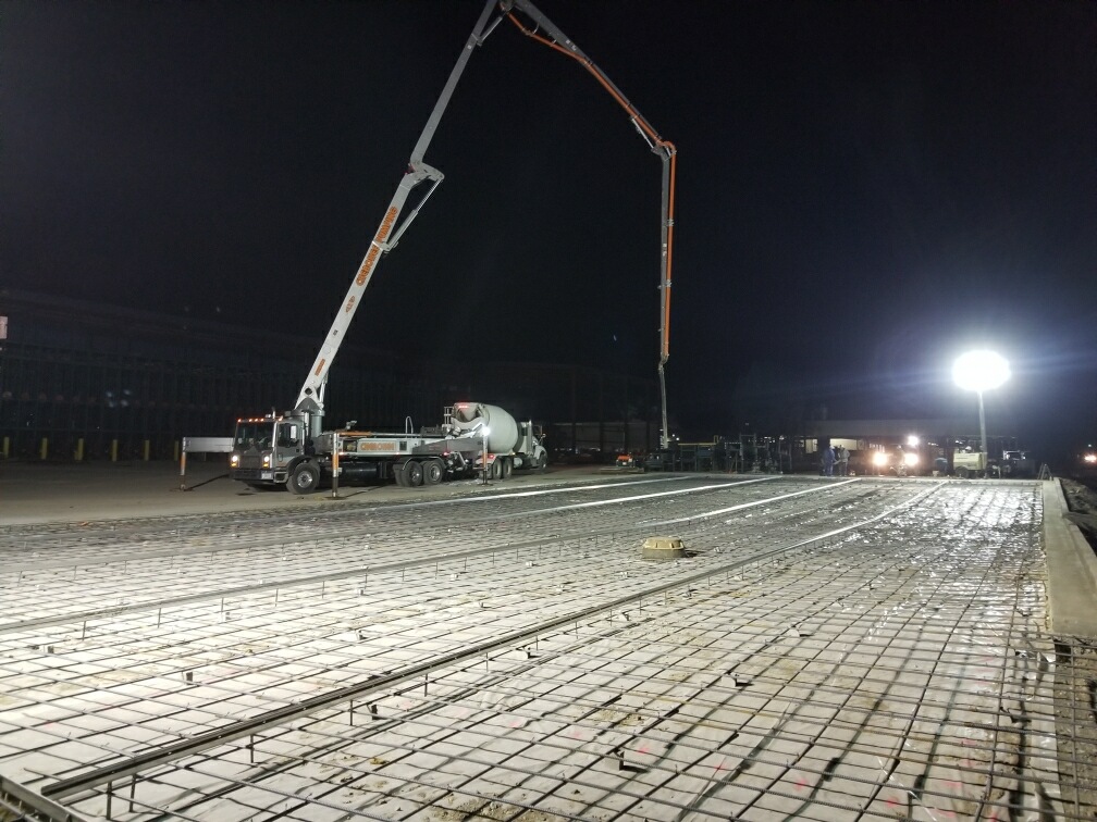 Mobile Concrete large crane and concrete equipment at night